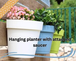 Hanging planter with attached saucer